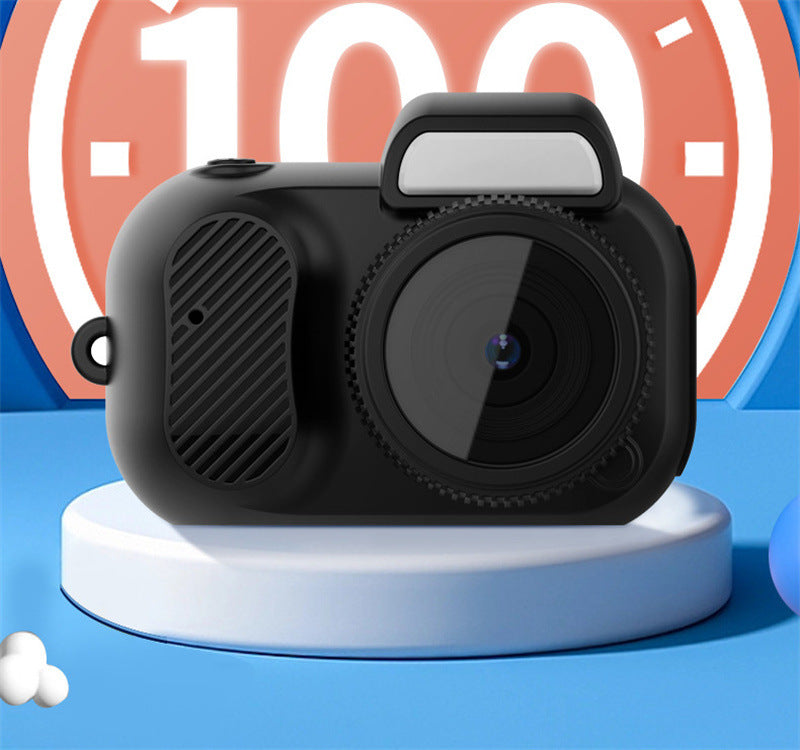 Black camera-shaped object on a white platform with a colorful background