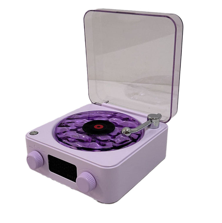 Purple vintage-style record player with open lid on a white background