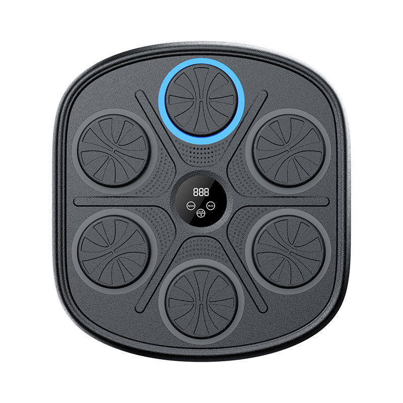 Black electronic device with circular components and a digital display on a white background