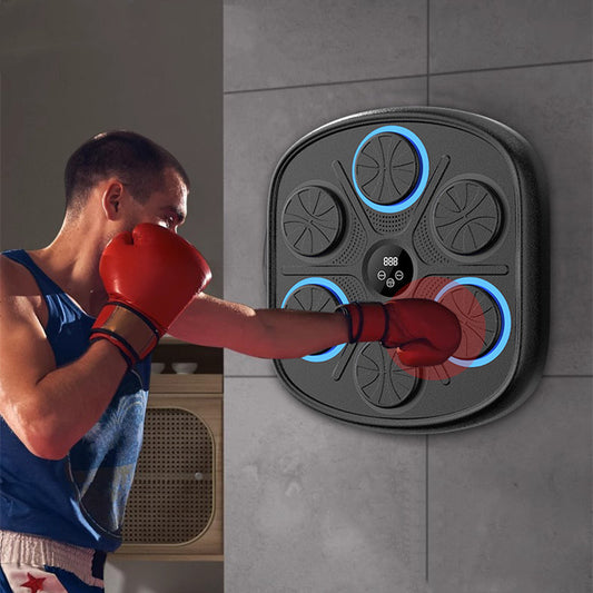 Person wearing red boxing gloves interacting with a wall-mounted boxing training device.
