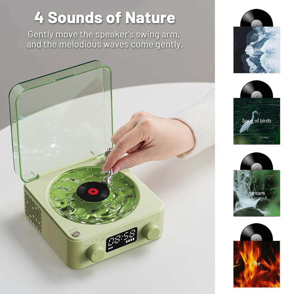 Green record player with a hand placing a vinyl record on it, surrounded by images of nature-themed records.