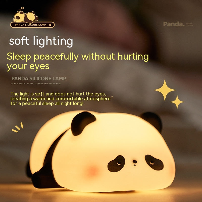 Panda silicone lamp with soft lighting on a dark background